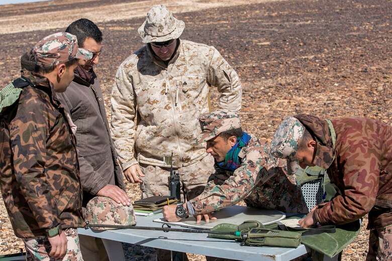 U.S. Marine Cpl. Cameron Joseph, a forward observer with 4th Air/Naval Gunfire Liaison Company Detachment, Special Purpose Marine Air-Ground Task Force – Crisis Response – Central Command, trains alongside a Jordanian mortar team with the Jordanian Quick Reaction Force during a close air support live fire exercise in Jordan, Feb. 19, 2017.4th ANGLICO, M Detachment, an all Reserve unit based out of West Palm Beach, Florida, is currently forward deployed in the Middle East with SPMAGTF-CR-CC. M Detachment is comprised of forward observers, radio operators, joint fires observers, artillery officers and a corpsman, all of which play an important role in the SPMAGTF’s crisis response mission.    (U.S. Marine Corps photo by Lance Cpl. Kyle McNan)