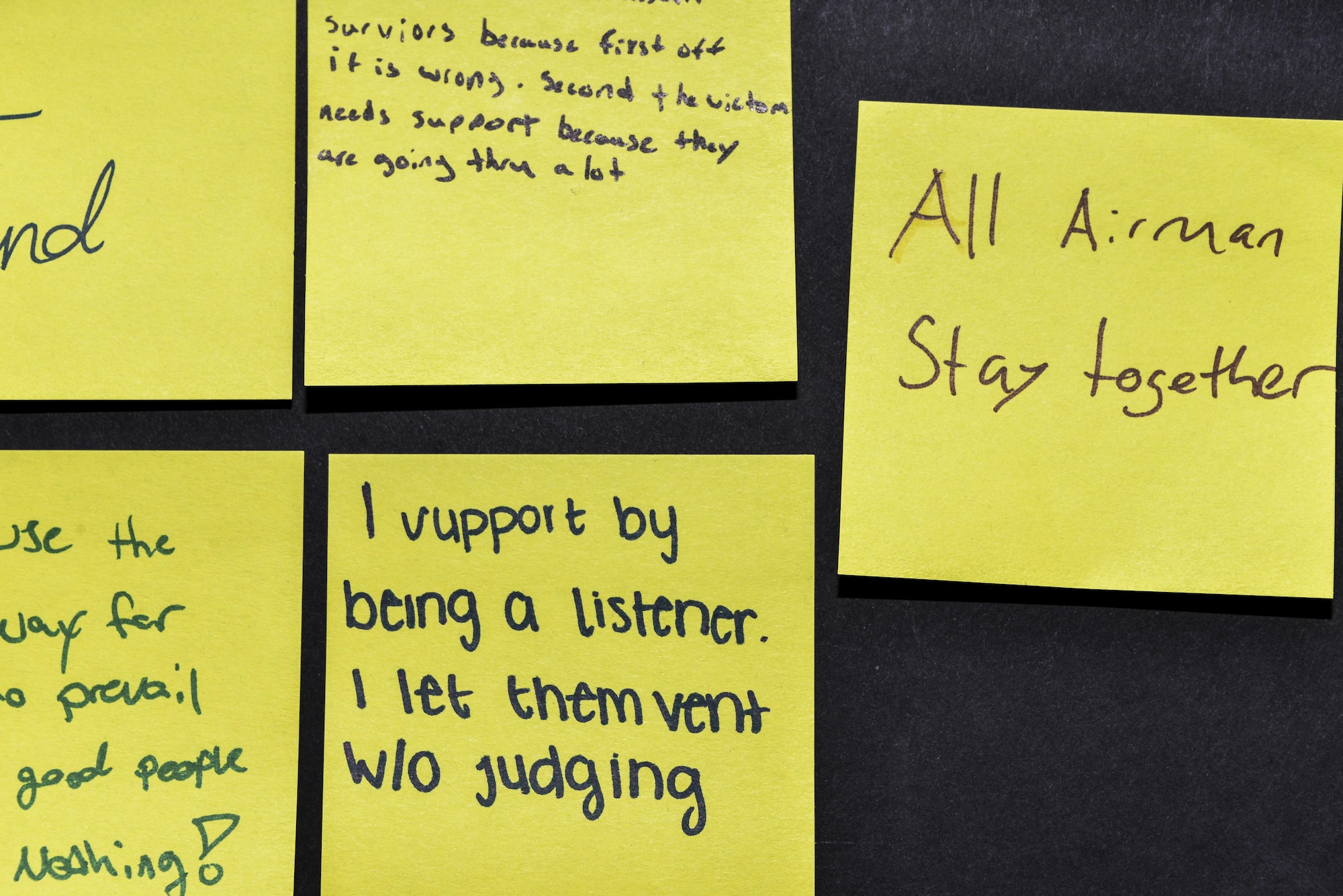 Stick with Survivors is a project created by the 70th Intelligence, Surveillance and Reconnaissance Wing Sexual Assault Prevention and Response office. The project assists military and civilian members in showing their support for sexual assault survivors. Participants write anonymous messages on sticky notes that will be displayed throughout the year during Comprehensive Airman Fitness events, Green Dot trainings and other wing event to help show support for victims of sexual assault. (U.S. Air Force photo by Staff Sgt. Alexandre Montes)