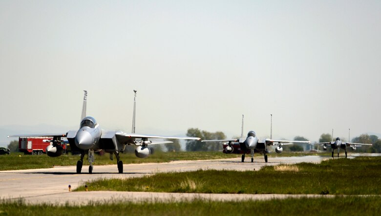 Twelve F-15C Eagles from the 122nd Expeditionary Fighter Squadron arrived at Graf Ignatievo Air Base, Bulgaria, April 26. Along with the aircraft, approximately 300 Airmen from the Louisiana and Florida Air National Guard are deployed to Europe as part of a Theater Security Package in support of Operation Atlantic Resolve with the goal of strengthening interoperability and enhancing regional security. (U.S. Air Force photo by Tech. Sgt. Staci Miller)