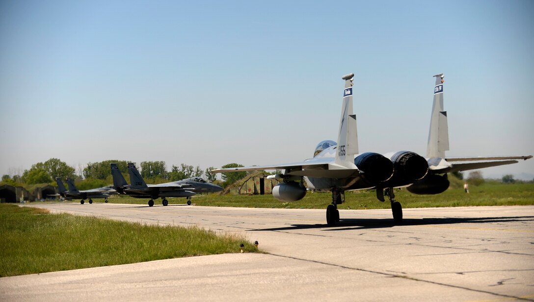 Twelve F-15C Eagles from the 122nd Expeditionary Fighter Squadron arrived at Graf Ignatievo Air Base, Bulgaria, April 26. Along with the aircraft, approximately 300 Airmen from the Louisiana and Florida Air National Guard are deployed to Europe as part of a Theater Security Package in support of Operation Atlantic Resolve with the goal of strengthening interoperability and enhancing regional security. (U.S. Air Force photo by Tech. Sgt. Staci Miller)