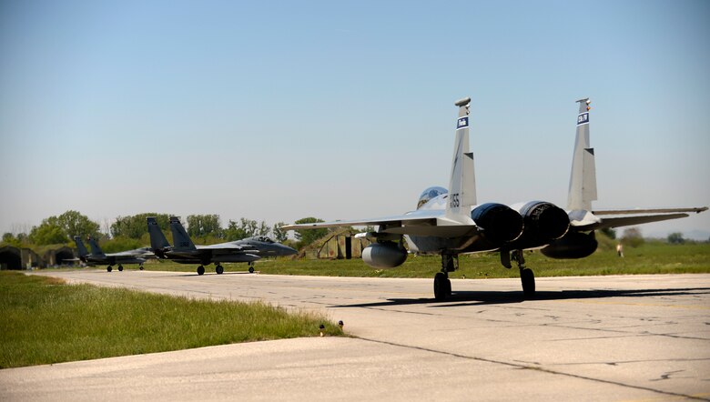 Twelve F-15C Eagles from the 122nd Expeditionary Fighter Squadron arrived at Graf Ignatievo Air Base, Bulgaria, April 26. Along with the aircraft, approximately 300 Airmen from the Louisiana and Florida Air National Guard are deployed to Europe as part of a Theater Security Package in support of Operation Atlantic Resolve with the goal of strengthening interoperability and enhancing regional security. (U.S. Air Force photo by Tech. Sgt. Staci Miller)