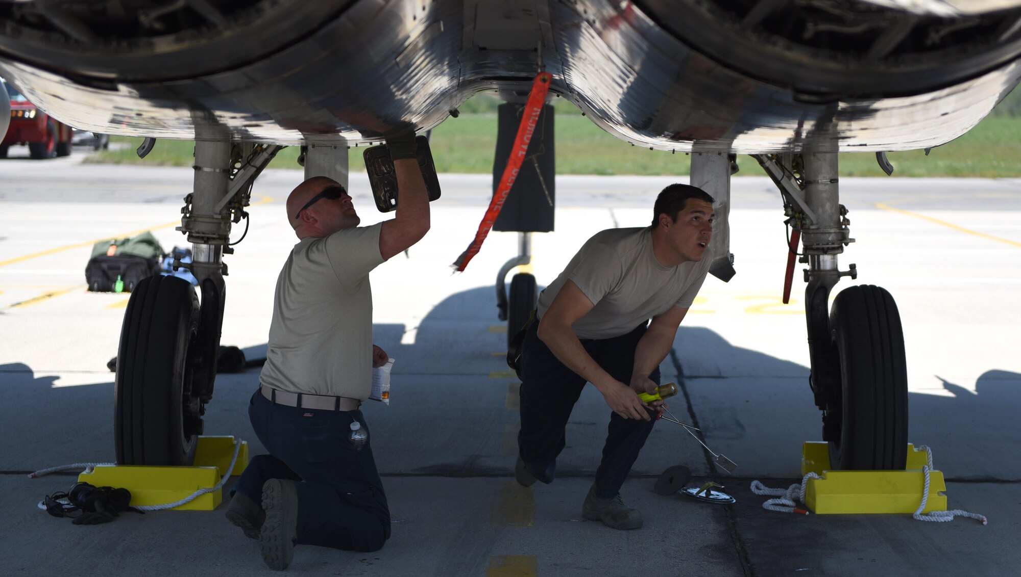Airmen from the 122nd Expeditionary Fighter Squadron perform maintenance at Graf Ignatievo Air Base, Bulgaria, April 26, 2017. F-15Cs from the Louisiana and Florida Air National Guard are deployed to Europe to participate in a Theater Security Package. These F-15s will conduct training alongside NATO allies to strengthen interoperability and to demonstrate U.S. commitment to the security and stability of Europe. (U.S. Air Force photo by Tech. Sgt. Staci Miller)