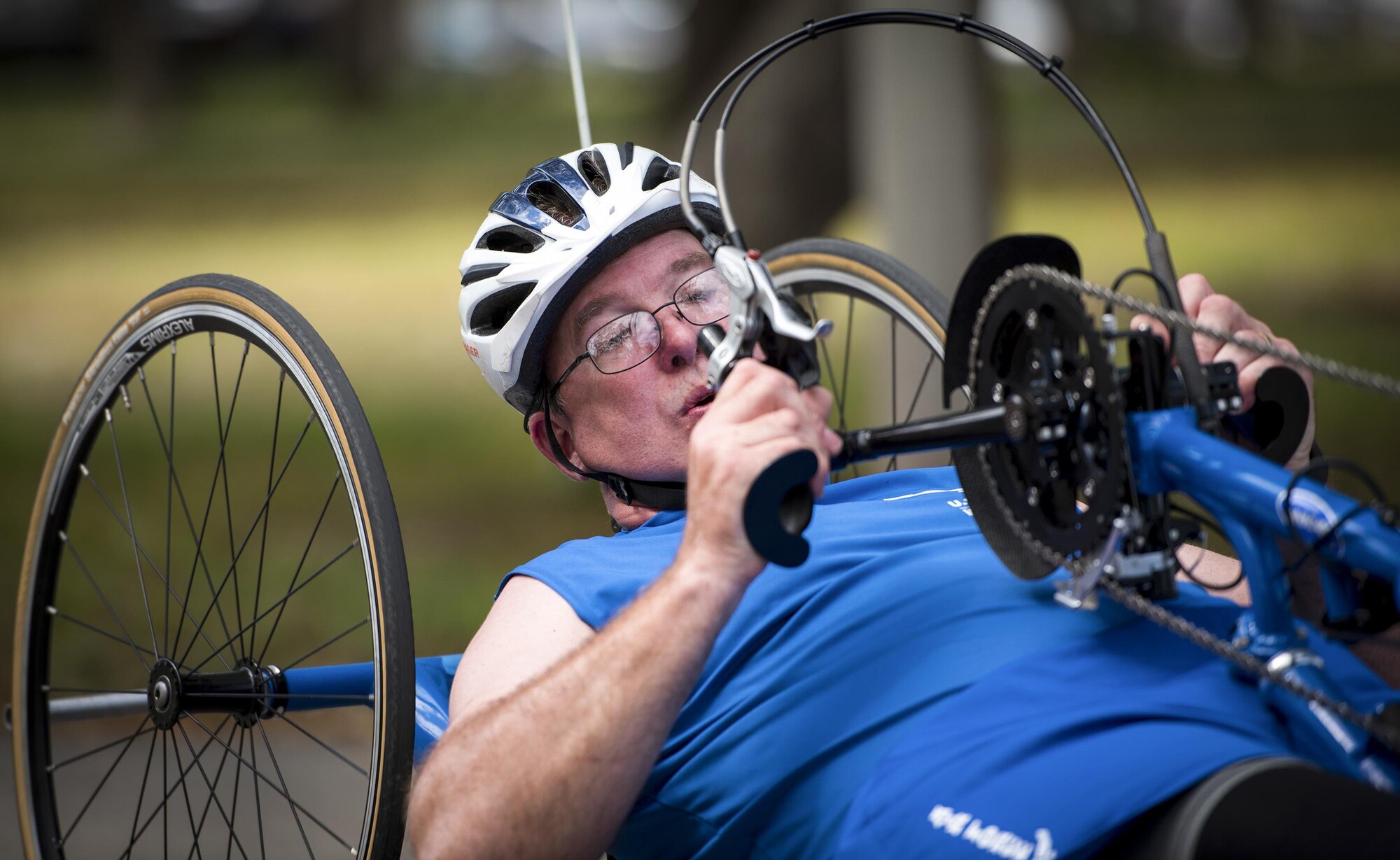 Chris Rust, a Warrior Games athlete, prepares to take a turn on a recumbent bike during a cycling session at the Air Force team’s training camp at Eglin Air Force Base, Fla., April 26. The base-hosted, week-long Warrior Games training camp is the last team practice session before the yearly competition in June. (U.S. Air Force photo/Samuel King Jr.)