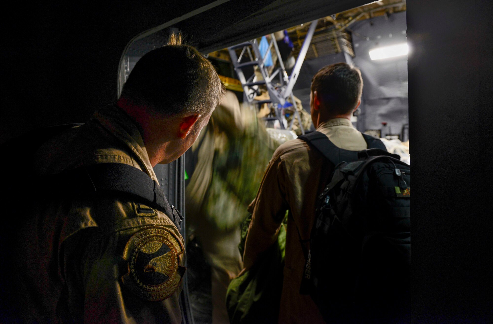 Airmen from the 555th Fighter Squadron enter a C-5 Galaxy at Aviano Air Base, Italy, April 19, 2017. The 555th FS departed on the C-5 for Bagram Airfield, Afghanistan. (U.S. Air Force photo by Airman 1st Class Ryan Brooks)