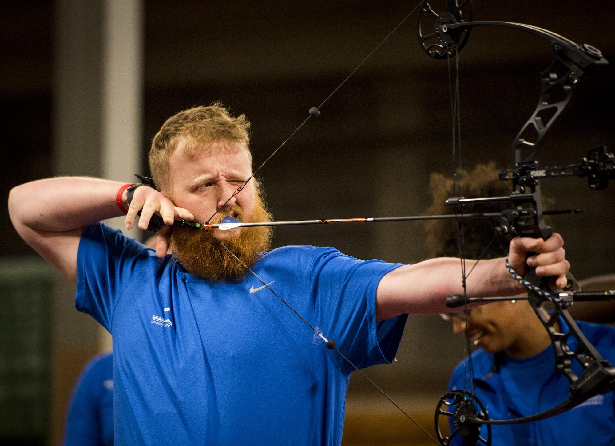 Robert Wiles, a Warrior CARE athlete, aims for a bullseye during an archery session at the adaptive sports camp at Eglin Air Force Base, Fla., April 24. The base hosts the week-long Wound Warrior CARE event that helps recovering wounded, ill and injured military members through specific hand-on rehabilitative training. (U.S. Air Force photo/Samuel King Jr.)