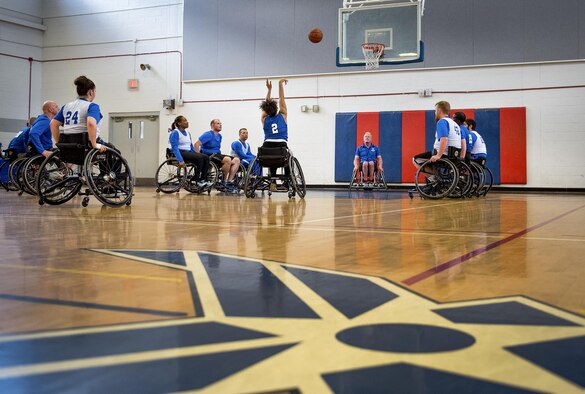 Jaquari Lopez, a Warrior CARE athlete, takes her foul shot during the wheelchair basketball session of the adaptive sports camp at Eglin Air Force Base, Fla., April 26. The base hosts the week-long Wound Warrior CARE event that helps recovering wounded, ill and injured military members through specific hand-on rehabilitative training. (U.S. Air Force photo/Samuel King Jr.)