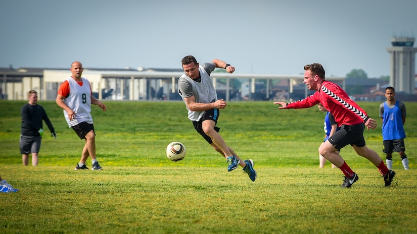 French air force and Royal air force Airmen attempt to gain control of a soccer ball during the ATLANTIC TRIDENT 17 soccer tournament, at Joint Base Langley-Eustis, Va., April 22, 2017. While the exercise is intended to share and develop training, tactics and procedures to enable interoperability, the Airmen from the U.S. Air Force, FAF and RAF found themselves gathering together off-duty to interact and learn more about each other. (U.S. Air Force photo/Staff Sgt. Areca T. Bell)