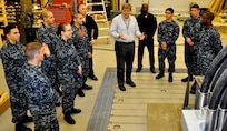 DAHLGREN, Va. (April 14, 2017) - Navy Electromagnetic Railgun Lead Systems Engineer Chester Petry explains railgun components and technology to Sailors from Aegis Training and Readiness Center (ATRC). The Sailors are taking ATRC courses that provide them with the knowledge, ability, and skill to operate and maintain the Aegis Combat System.
