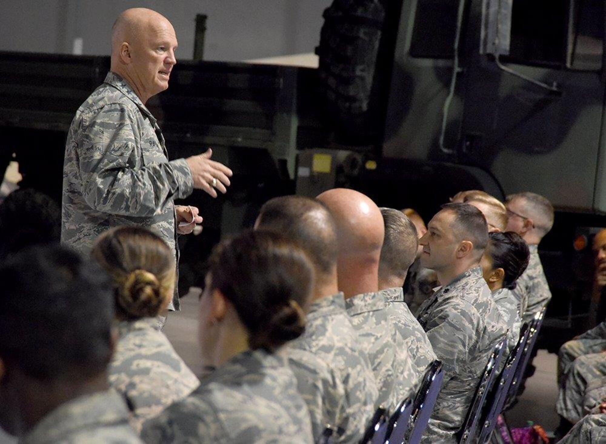 Gen. Jay Raymond, Air Force Space Command commander, conducts an all call with the the 5th Combat Communications Group at the Museum of Aviation at Robins Air Force Base, Ga. April 24, 2017. During the general's visit, he toured the 5th CCG, the Warner Robins Air Logistics Complex, hosted an all call with the 5th Mob and attended a social with local community leaders at the Museum of Aviation. (U.S. Air Force photo/Ed Aspera)