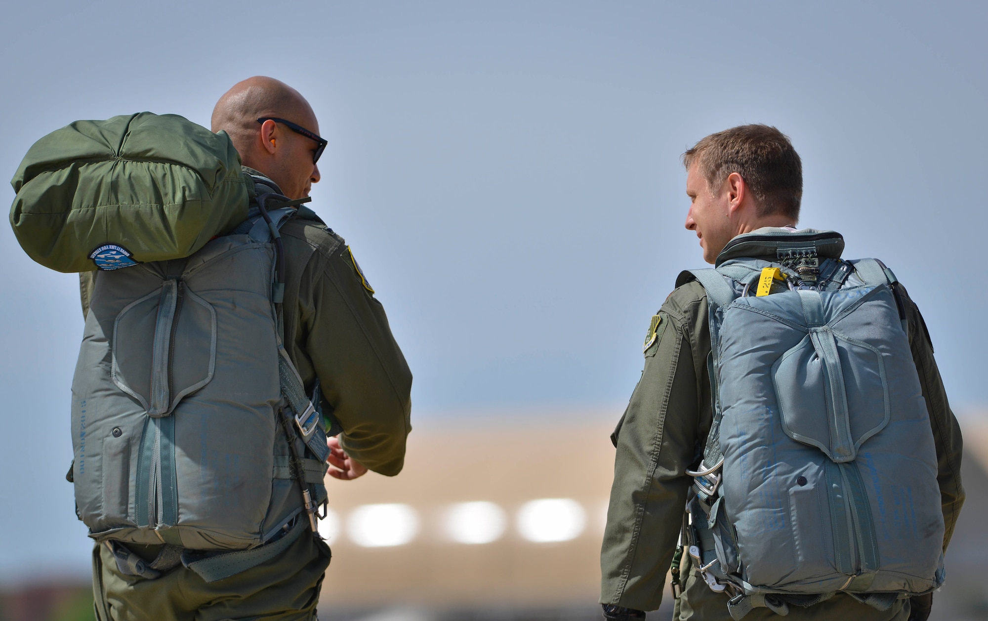 (From left) U.S. Air Force 1st Lt. Edward Galloway and Maj. Nathaniel Lightfoot, 71st Fighter Training Squadron aggressor pilots, return from an air combat training mission during ATLANTICTRIDENT 17 at Joint Base Langley-Eustis, Va., April 18, 2016. This exercise was designed to encourage
the sharing and development of air combat practices with both the French and Royal air force against a range of potential threats. (U.S. Air Force photo/Staff Sgt. Natasha Stannard)
