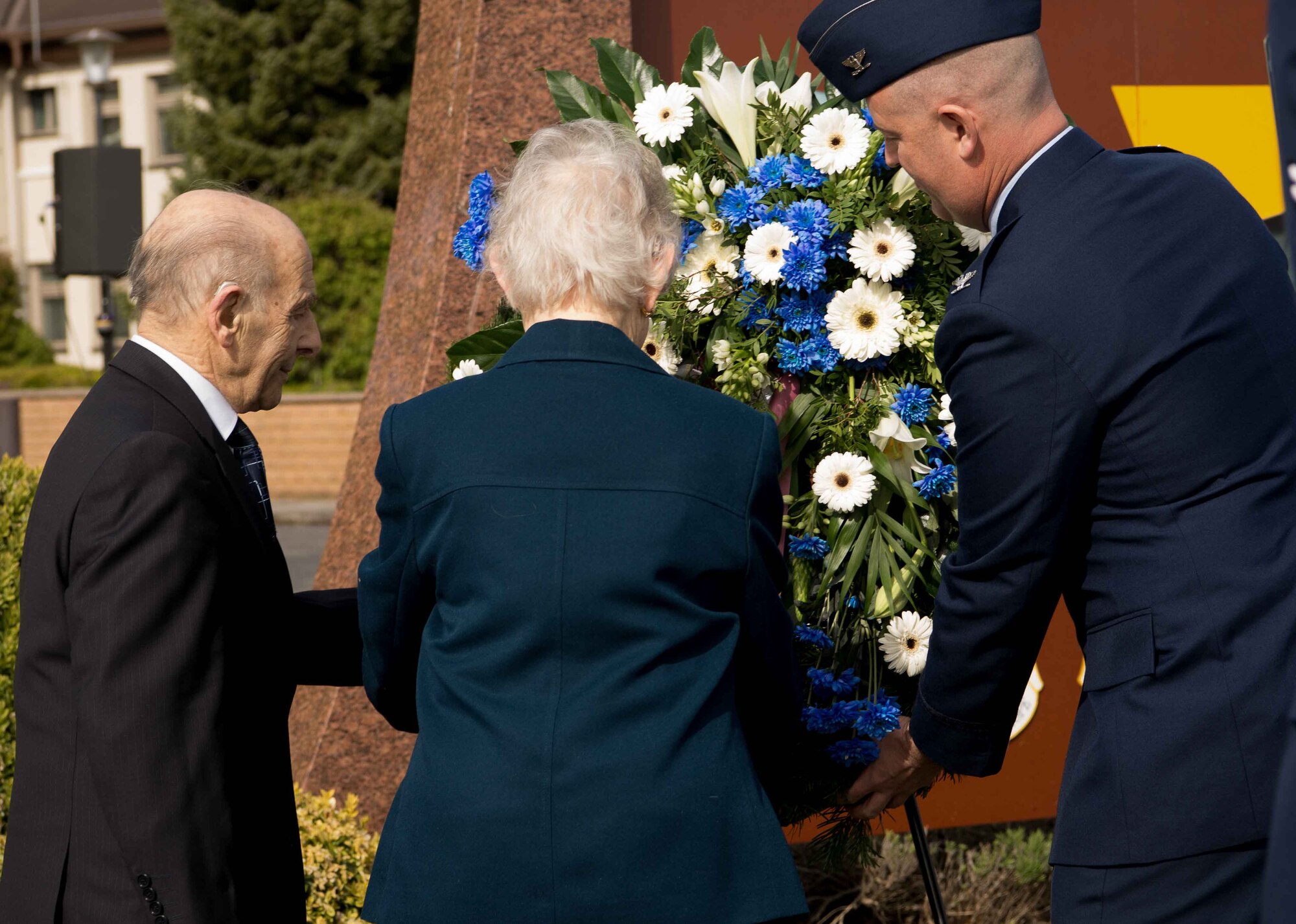 Bob and Ann Kirk, Holocaust survivors, participate in a wreath laying at the 86th Airlift Wing’s Holocaust Remembrance as honored guests at Ramstein Air Base, Germany, April 25, 2017. The 86th AW hosted the remembrance to honor the memory, culture and history of the estimated 11 million who were killed during the Holocaust. (U.S. Air Force photo by Senior Airman Elizabeth Baker)