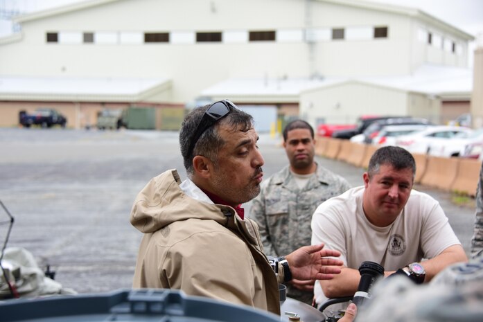 Alex Ibarra, CBRNE Training Specialist, Federal Resources instructs the members of the 166th Airlift Wing Patient Decontamination Team on the 976A CBRNE package during a refresher course conducted by Federal Resources at the Delaware Air National Guard Base, New Castle, De., 26 Apr 2017. (U.S. Air National Guard photo by SSgt. Andrew Horgan/released)