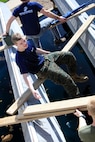Marine Corps officer candidates attempt to navigate a leadership reaction course obstacle aboard Camp Dodge, Johnston, Iowa, April 22, 2017. The Officer Candidate School (OCS) preparation weekend was held to enhance readiness through challenging and realistic training with a focus on basic Marine Corps knowledge and skills. (U.S. Marine Corps photo by Cpl. Zachery B. Martin)