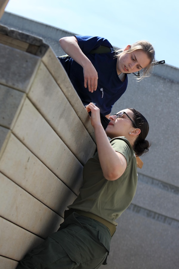 Marine Corps officer candidates attempt to navigate a leadership reaction course obstacle aboard Camp Dodge, Johnston, Iowa, April 22, 2017. The Officer Candidate School (OCS) preparation weekend was held to enhance readiness through challenging and realistic training with a focus on basic Marine Corps knowledge and skills. (U.S. Marine Corps photo by Cpl. Zachery B. Martin)