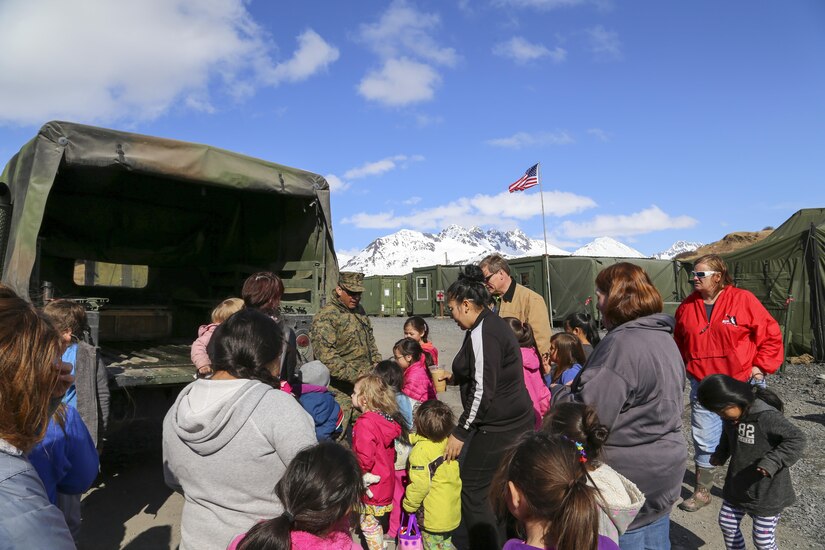 Students from Old Harbor School visit the Innovative Readiness Training site in Old Harbor, Alaska, April 20, 2017. The visit included a tour of the camp and worksite, along with rides in equipment being used to expand the existing runway. Army photo by Staff Sgt. Balinda O’Neal Dresel