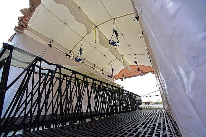 Members of the 166th Airlift Wing Patient Decontamination Team train on the 976A CBRNE package during a refresher course conducted by Federal Resources at the Delaware Air National Guard Base; New Castle; De.; 26 Apr 2017. (U.S. Air National Guard photo by SSgt. Andrew Horgan/released)