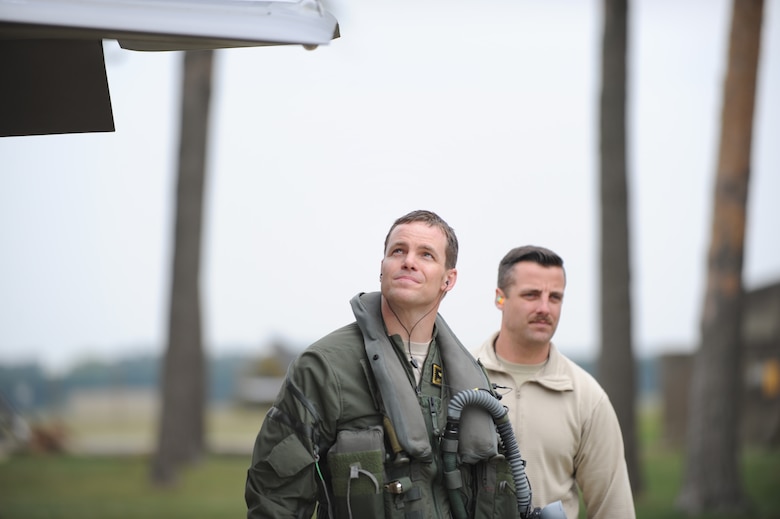 Maj. Jayson Rickard, F-35 pilot in the 419th Fighter Wing, and Tech. Sgt. Ryan Johnston, 419th crew chief, conduct a preflight check while deployed to Europe. Eight F-35A Lightning IIs and about 250 personnel from the Air Force Reserve 419th FW and active duty 388th FW at Hill Air Force Base, Utah, are in Europe for several weeks and will travel to multiple NATO bases in an effort to maximize training opportunities and demonstrate U.S. support to NATO. In their civilian lives, Rickard is a pilot for Delta Air Lines and Johnston works for SkyWest Airlines. Both reservists are currently on full-time orders to help fortify F-35A operations at Hill AFB. (U.S. Air Force photo/Micah Garbarino) 