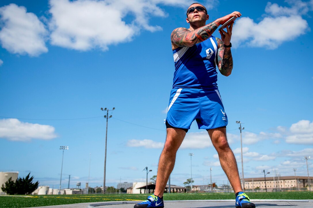 Rafael Morfin, an Air Force Warrior Games team member, begins his discus rotation during a practice session at the team’s training camp at Eglin Air Force Base, Fla., April 26, 2017. Air Force photo by Samuel King Jr.