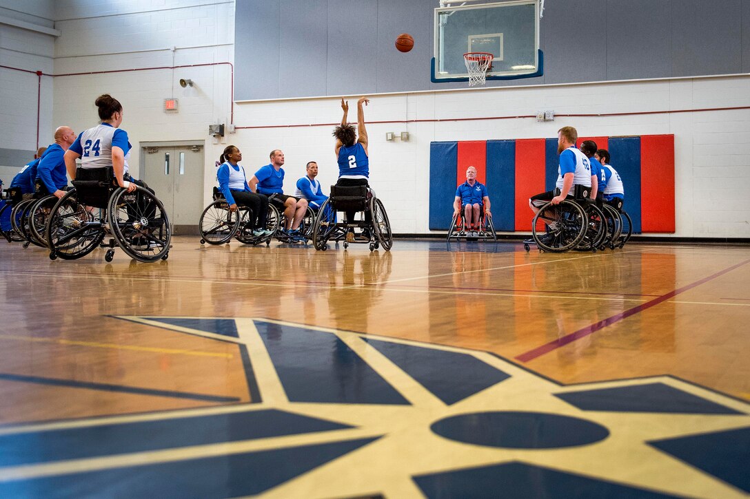 Jaquari Lopez, a Warrior CARE athlete, takes her foul shot during an adaptive sports camp at Eglin Air Force Base, Fla., April 26, 2017. Air Force photo by Samuel King Jr.