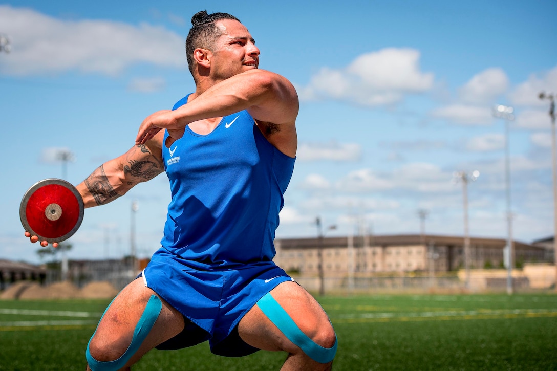 Air Force Staff Sgt. Vince Cavazos, an Air Force Warrior Games team member, begins his discus rotation during a practice session at the team’s training camp at Eglin Air Force Base, Fla., April 26, 2017. Air Force photo by Samuel King Jr.