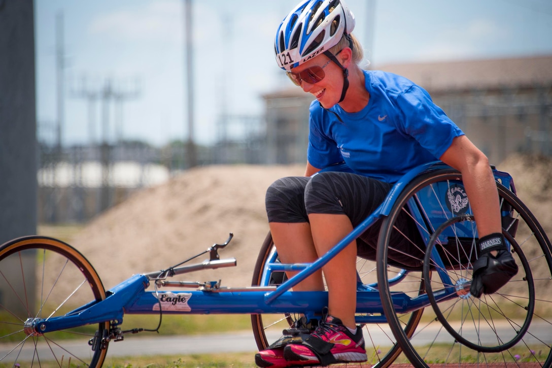 A Warrior CARE athlete tries out a track and field chair during the track and field session of the adaptive sports camp at Eglin Air Force Base, Fla., April 26, 2017. The base hosts the weeklong Wounded Warrior CARE event that helps recovering wounded, ill and injured airmen through specific hands-on rehabilitative training. The acronym "CARE" stands for caregiver support; adaptive and rehabilitative sports; recovering airman mentorship; and employment and career opportunities. Air Force photo by Samuel King Jr.