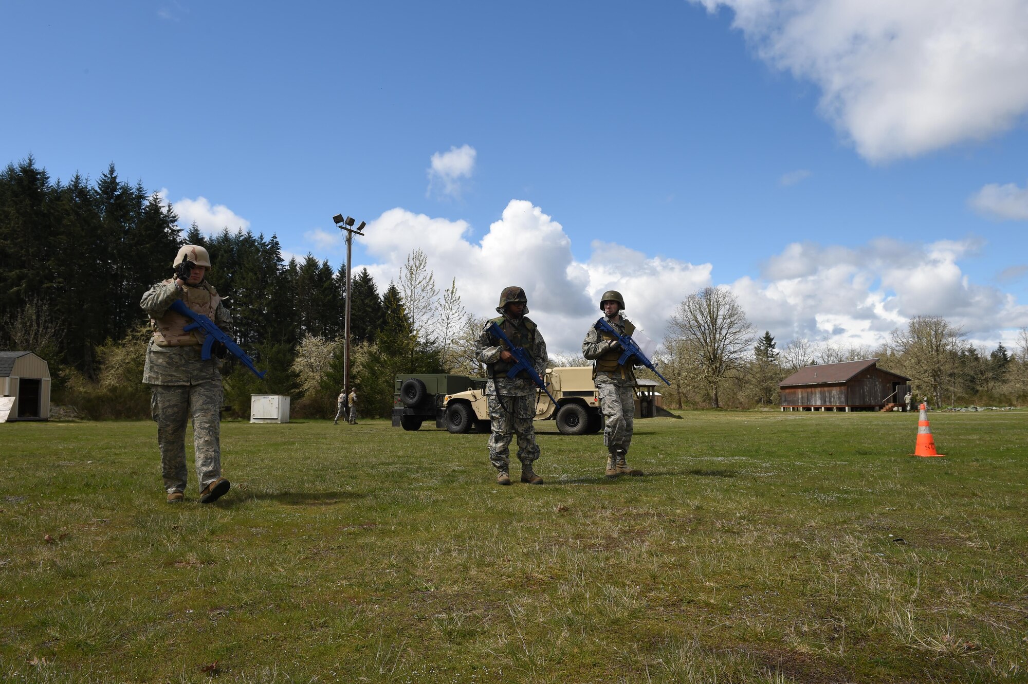 627th Civil Engineer Squadron Airmen use their land navigation training during their internal Capstone exercise April 20, 2017 at Joint Base Lewis-McChord, Wash. The capstone, which consisted of an evaluation where they simulated being in a deployed environment and had to build a base from the ground up in a contested environment, was used as an internal evaluation method tool to measure readiness for a year’s worth of contingency training. (U.S. Air Force photo/ Staff Sgt. Naomi Shipley)