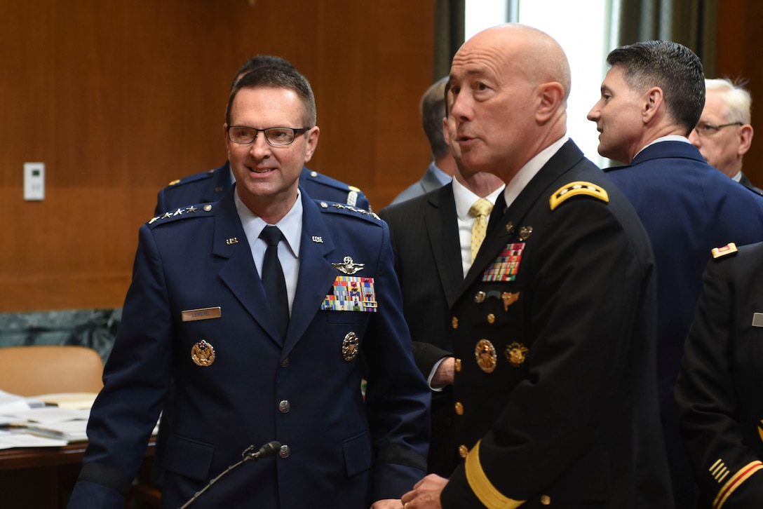 Air Force Gen. Joseph Lengyel, the chief of the National Guard Bureau, talks with Lt. Gen. Charles D. Luckey, chief of Army Reserve, before the Senate Appropriations Subcommittee Defense hearing on National Guard and Reserve Programs and Readiness, April 26, 2017. (National Guard photo by Tech. Sgt. Erich B. Smith/Released)