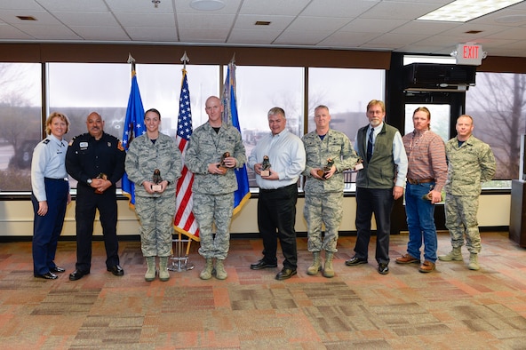 Col. DeAnna Burt, 50th Space Wing commander, celebrates with the Quarterly award-winners during the First Quarter's Award Breakfast at Schriever Air Force Base, Colorado, Fiday, April 21, 2017. Award winners are selected each quarter based on different categories, such as civilian supervisor, Airman and field grade officer. 