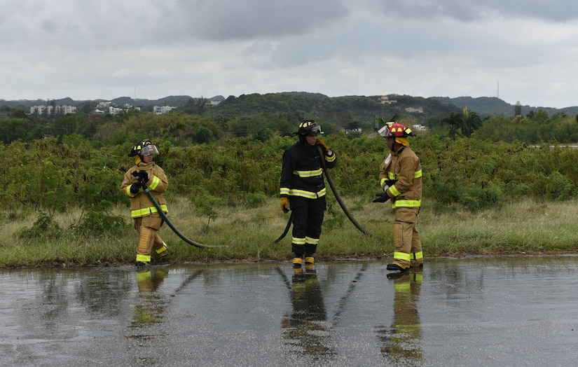 Soldiers assigned to the 266th Ordinance Company as firefighters prepare to recover their equipment after successfully extinguishing a notional fire as part of the Tropical Journey exercise help at the Rafael Hernandez Airport in Aguadilla on April 24. Tropical Journey (TJ) is a full-scale VA driven “All Hazard Preparedness Response” exercise that began in 2005 and occurs every three years. The TJ17 scenario enables participants to assess objectives and core capabilities. This full-scale exercise provides a platform for 1st Mission Support Command unit leadership to evaluate METL collective training tasks within a DSCA operational environment.