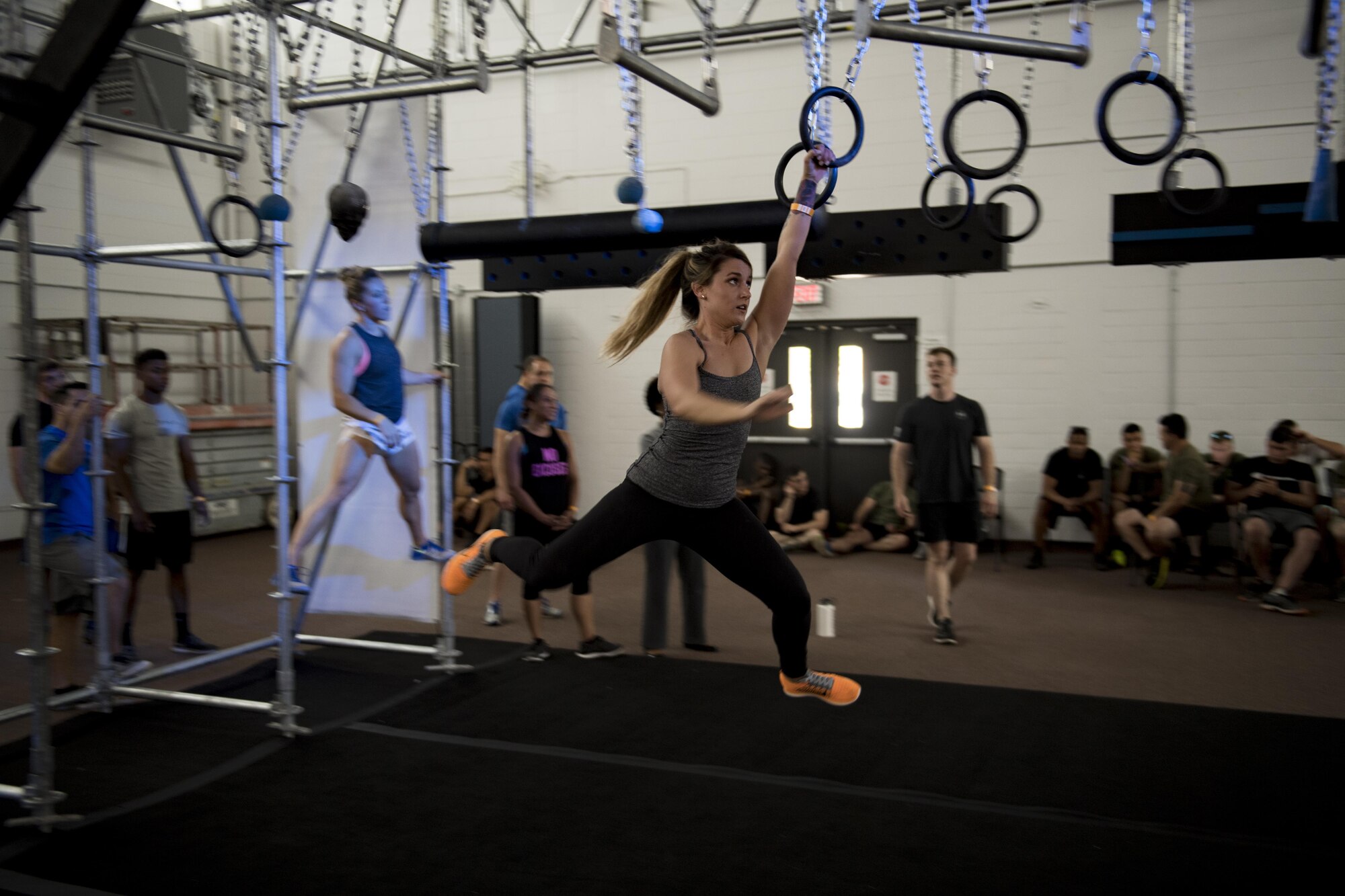 An Alpha Warrior participant swings across an obstacle in the Alpha Warrior obstacle course, April 26, 2017, at Moody Air Force Base, Ga. The Air Force Services Activity partnered with the Alpha Warrior team to promote Comprehensive Airman Fitness. Winners earned an opportunity to compete in an Air Force-wide Alpha Warrior championship.  (U.S. Air Force photo by Airman 1st Class Daniel Snider)