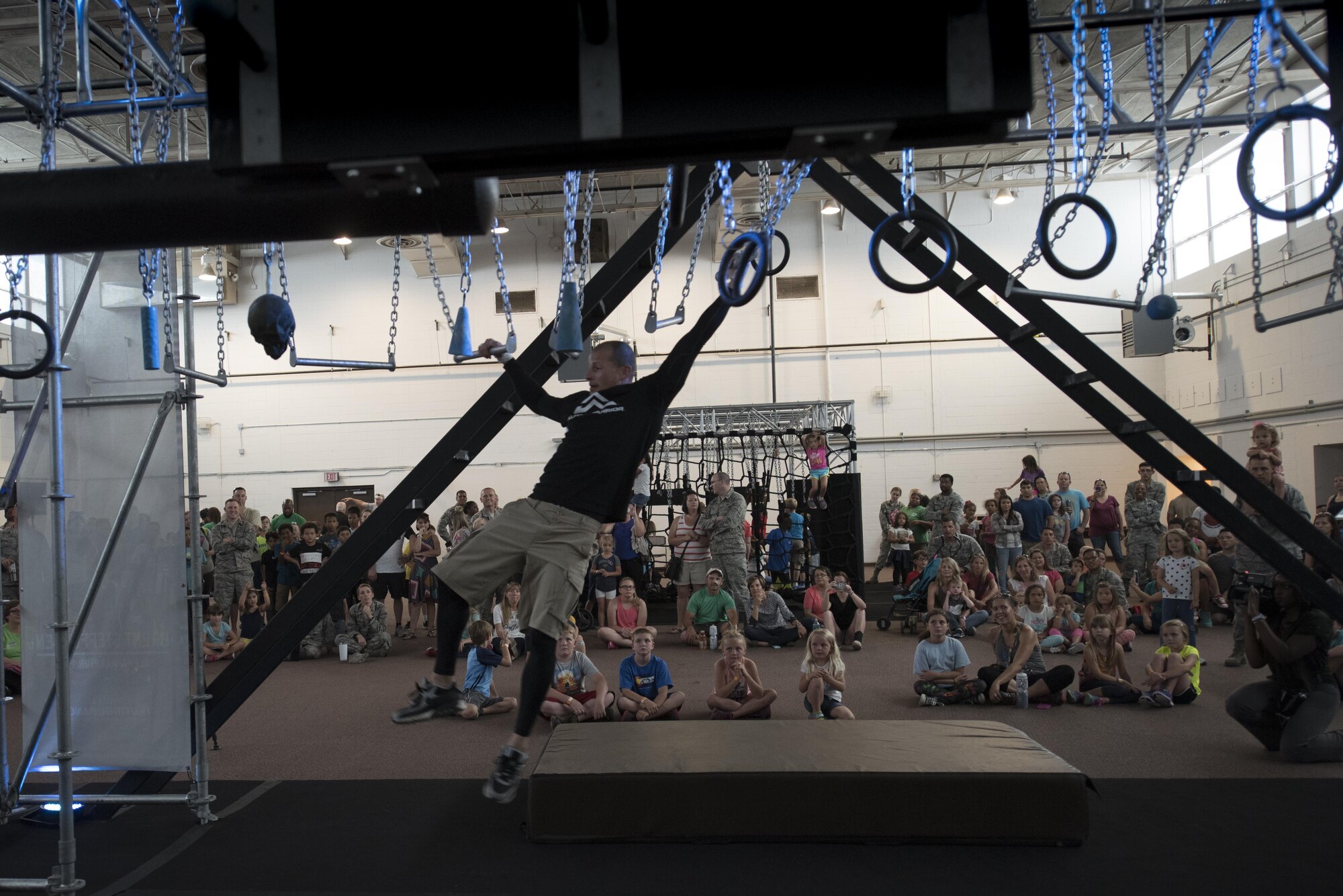 Brent Steffensen, Alpha Warrior team member, swings through the Alpha Warrior obstacle course, April 26, 2017, at Moody Air Force Base, Ga. The Air Force Services Activity partnered with the Alpha Warrior team to promote Comprehensive Airman Fitness. Winners earned an opportunity to compete in an Air Force-wide Alpha Warrior championship.  (U.S. Air Force photo by Airman 1st Class Daniel Snider)