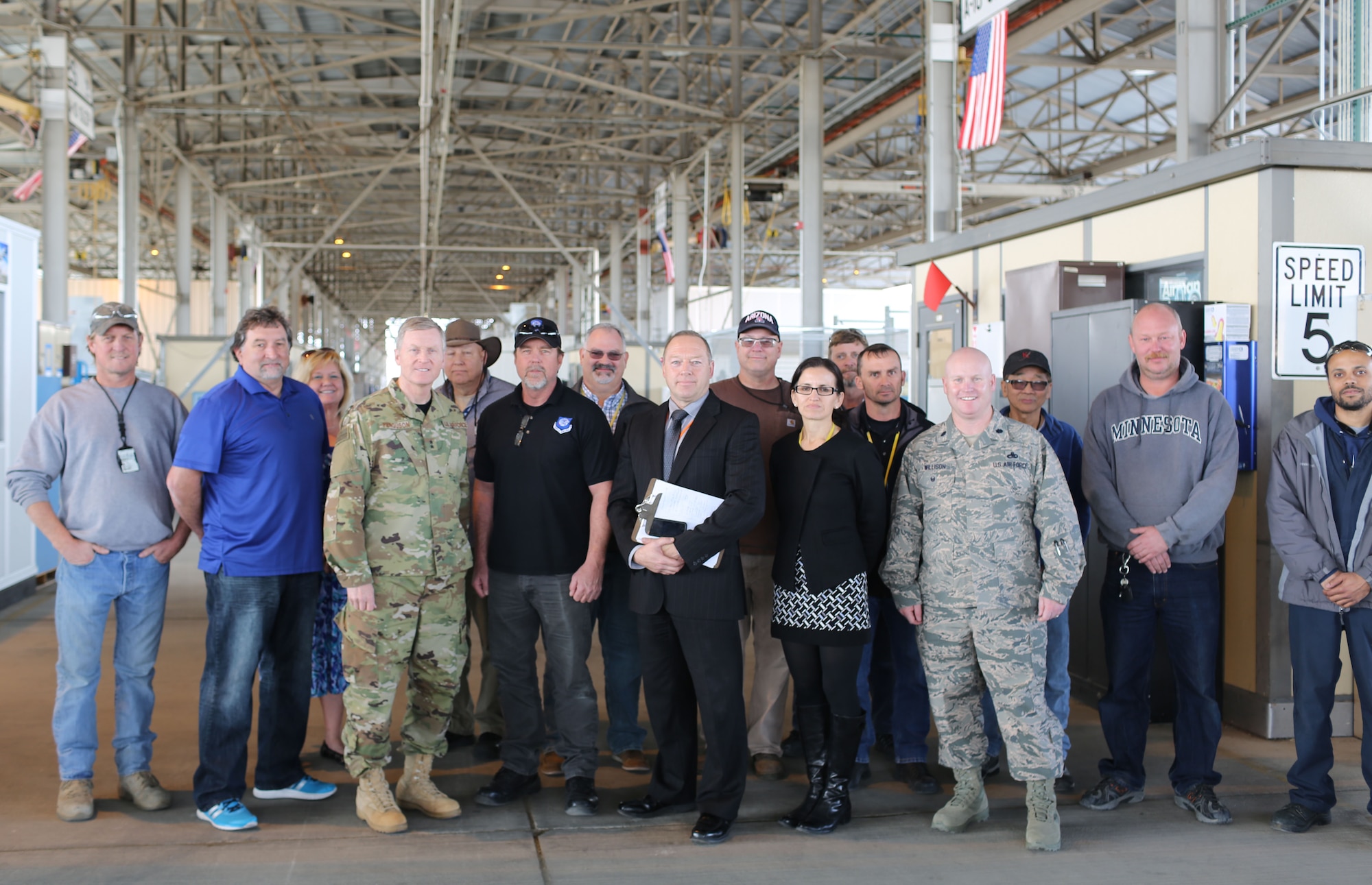 After recognizing the 309th Aerospace Maintenance and Regeneration Group for their contribution to the MC-130H and AC-130 sustainment program, Maj. Gen. Gregory Ferguson, the Air National Guard Assistant to the Commander, Air Force Special Operations Command, meets with the team credited with the C-130 outer wing refurbishment program. From left, James Courson, Robert Cappell, Caroline Sturm, Maj. Gen. Ferguson, Loren Higgins, Dave Lang, Tony Draper, Timothy Gray, Mark Perrodin, Shirley Mercier, Chris Watkins, Scott McClure, Lt. Col. Daniel Willison, Binh Tran, Richard Barrett and Mathew Tucker. (U.S. Air Force photo)