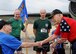 Retired Col. Steven dePyssler shakes hands with retired Tech. Sgt. John Carpenter, both World War II veterans, during a Mighty Eighth Heritage 8K event at Barksdale Air Force Base, La., April 26, 2017. Former and present Eighth Air Force heroes were honored during the event to recognize the service and sacrifices they made for their country. The run served as one of the many events held in commemoration of the Eighth Air Force’s 75th anniversary. (U.S. Air Force photo by Senior Airman Erin Trower)