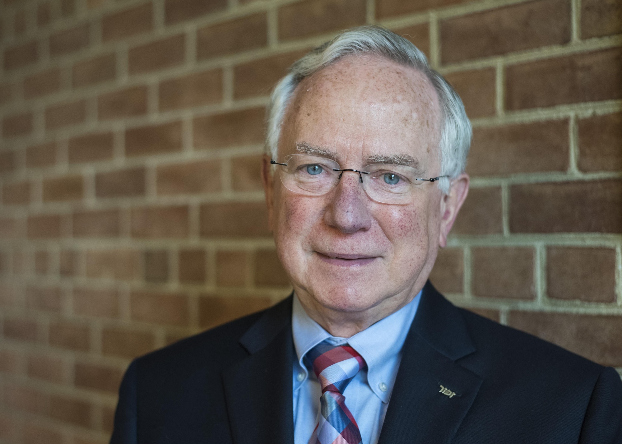 Dr. Alfred Münzer, Holocaust survivor, poses for a portrait prior to the Holocaust Commemoration at Joint Base Andrews, Md., April 26, 2017. Dr. Alfred Münzer was just nine months old when his family was separated during the Nazi Regime occupation of Holland, but he grew up hearing about his relatives’ hardships. (U.S. Air Force photo by Senior Airman Jordyn Fetter)