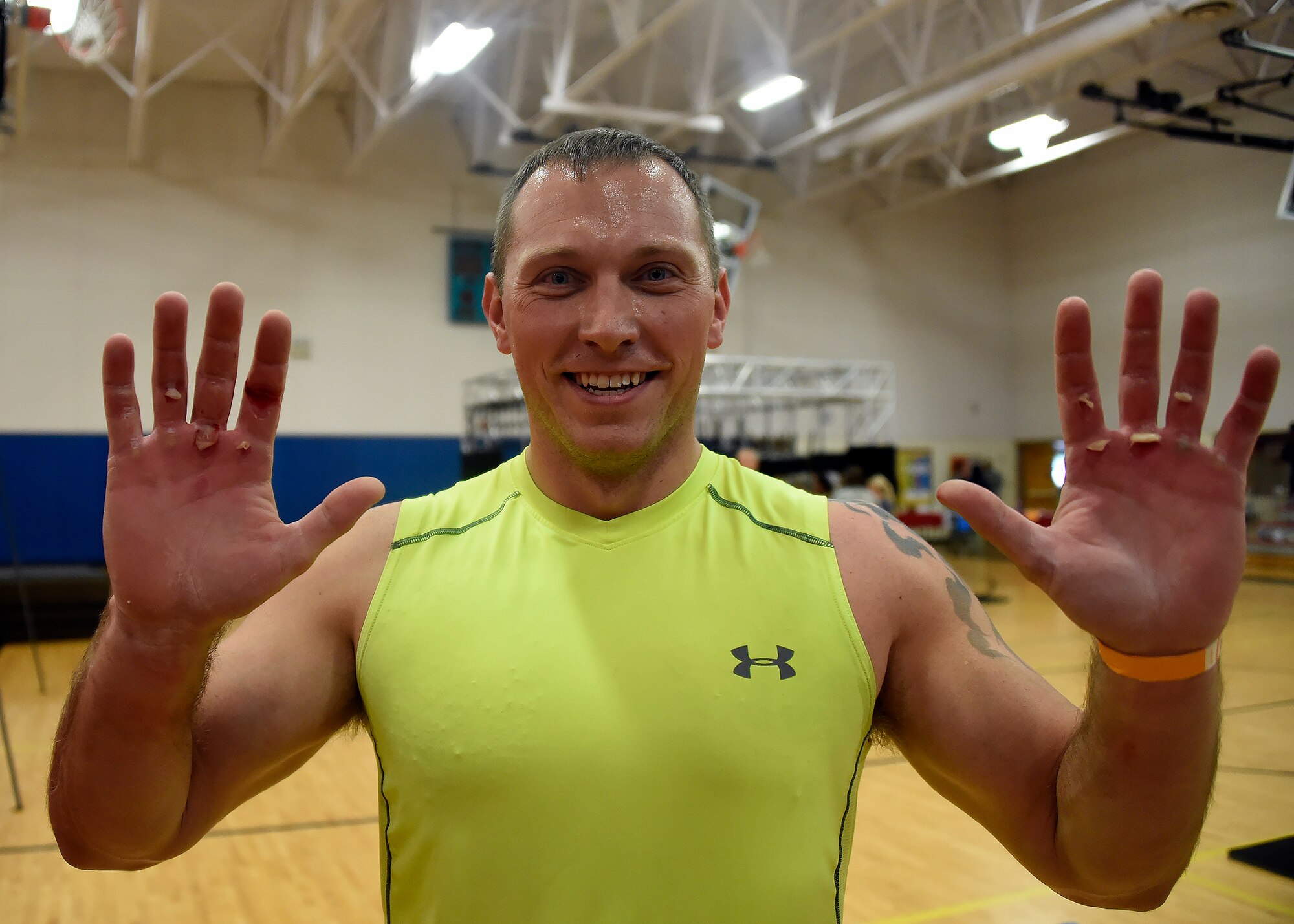 Staff Agt. Brian Davis, 56th Component Maintenance Squadron hydraulic shift lead, shows off his battle scars after completing the Alpha Warrior competition April 27, 2017, at Luke Air Force Base, Ariz. The Alpha Warrior program incorporates the four domains of Comprehensive Airman Fitness- physical, mental, social and spiritual-to achieve readiness and resilience at home and while deployed. (U.S. Air Force photo by Senior Airman Devante Williams)