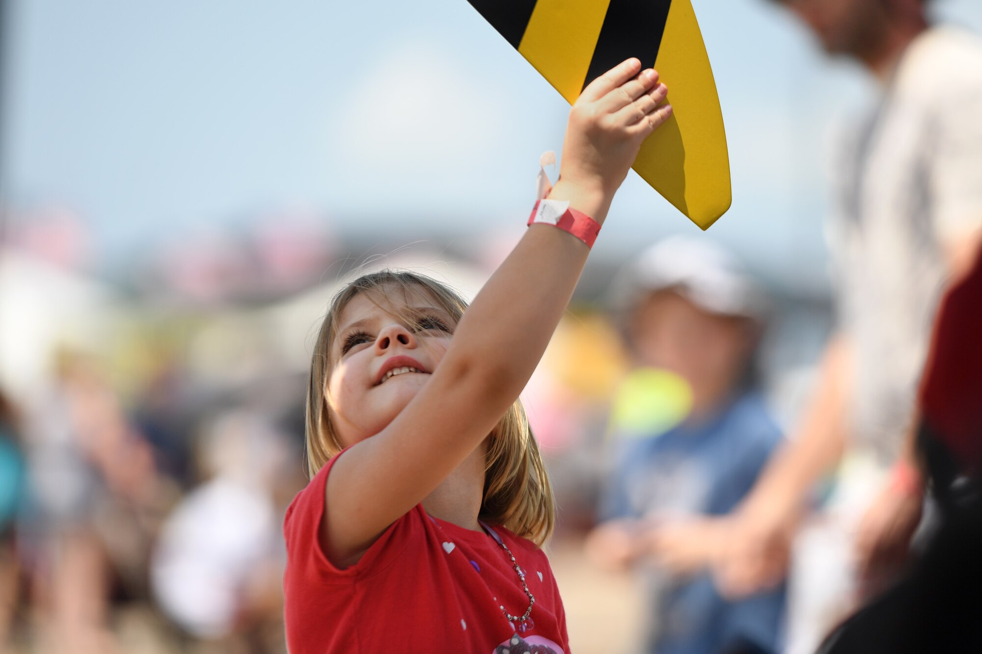 A child grips the end of the MQ-9 Reaper model propeller during the 2017 Gulf Coast Salute Open House and Air Show April 22, 2017, at Tyndall Air Force Base, Fla. The MQ-9 model was revealed for the first time and provided visitors an up-close look at the MQ-9 and the Airmen that operate and support the aircraft. (U.S. Air Force photo/Airman 1st Class James Thompson)