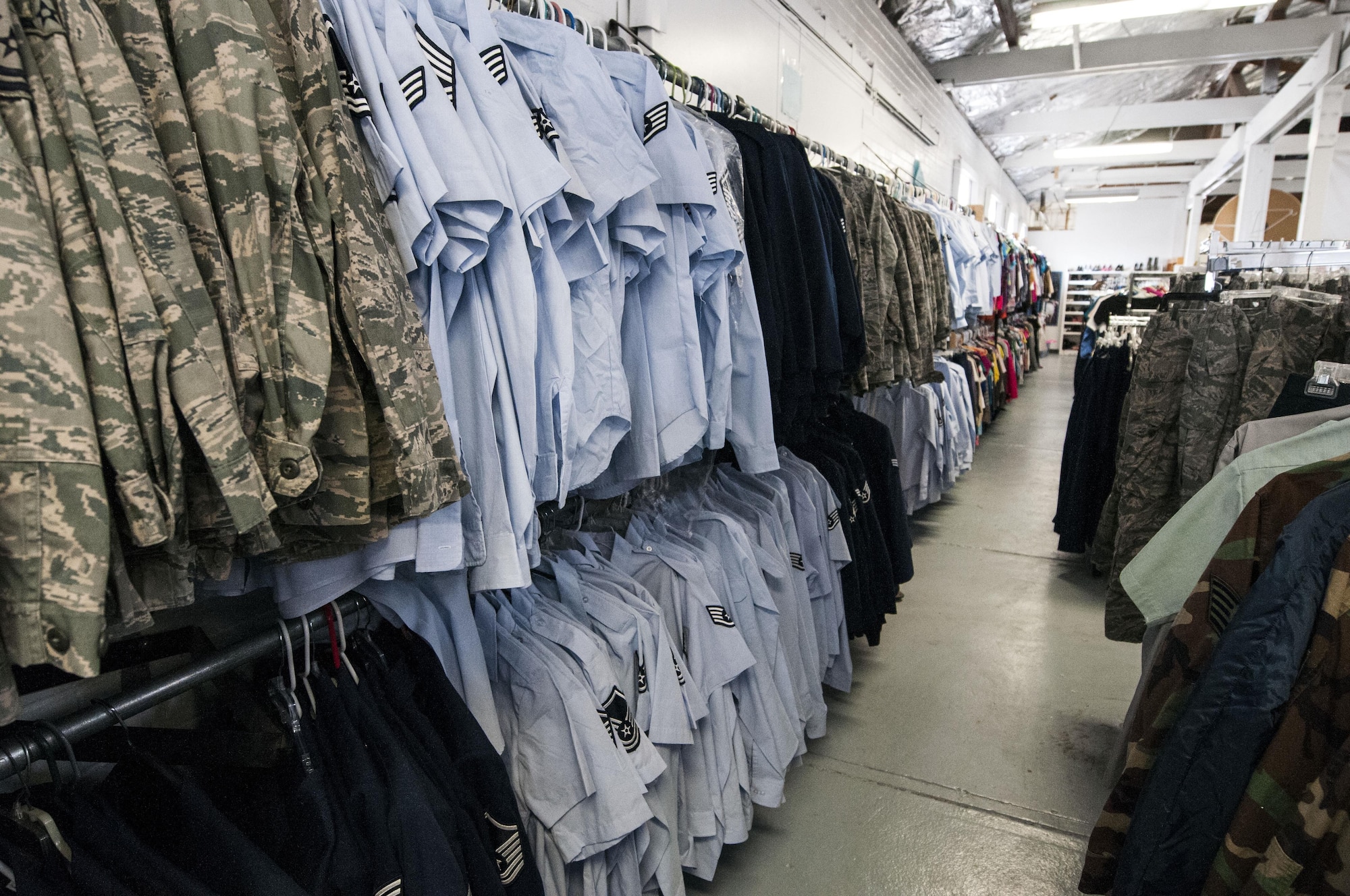 Military uniforms line the wall at the Airman’s Attic on F.E. Warren Air Force Base, Wyo., April 26, 2017. Military Tuesday was enacted to ensure the attic is accessible to military members and is open from 10:30 a.m. to 12:30 pm for active duty members only. The Airman’s Attic is a base resource where Airmen, dependents and retirees can shop for free through donated goods. (U.S. Air Force photo by Staff Sgt. Christopher Ruano)