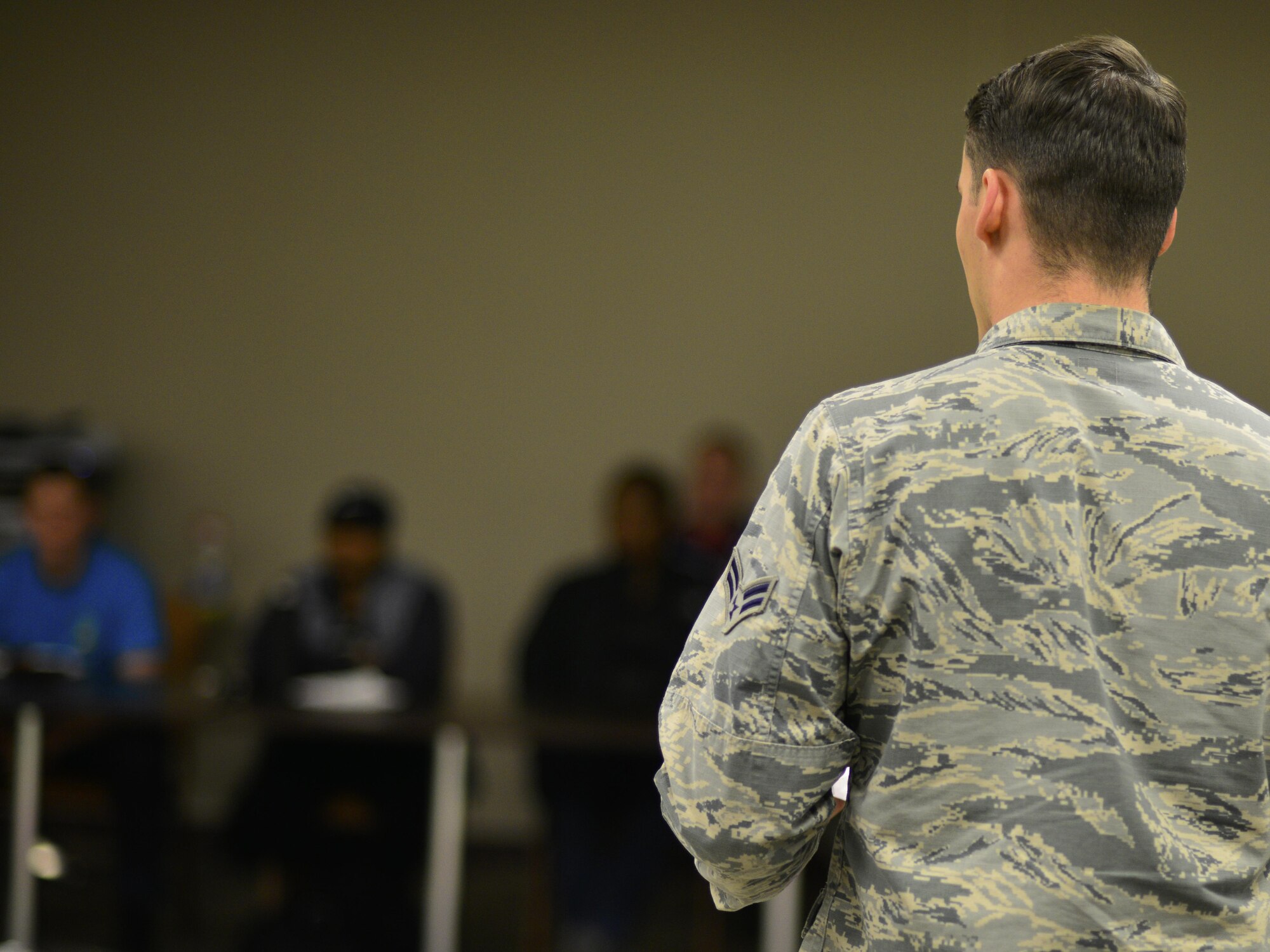 U.S. Air Force Airman 1st Class William Byrn, Osan Junior Enlisted Council treasurer, introduces a speaker during the Storytellers event at Osan Air Base, Republic of Korea, April 26, 2017. The event was hosted by the Osan Junior Enlisted Council and the First Sergeants Council, and covered a variety of topics including preparedness, resiliency and shades of ambiguity. (U.S. Air Force photo by Staff Sgt. Alex Fox Echols III)