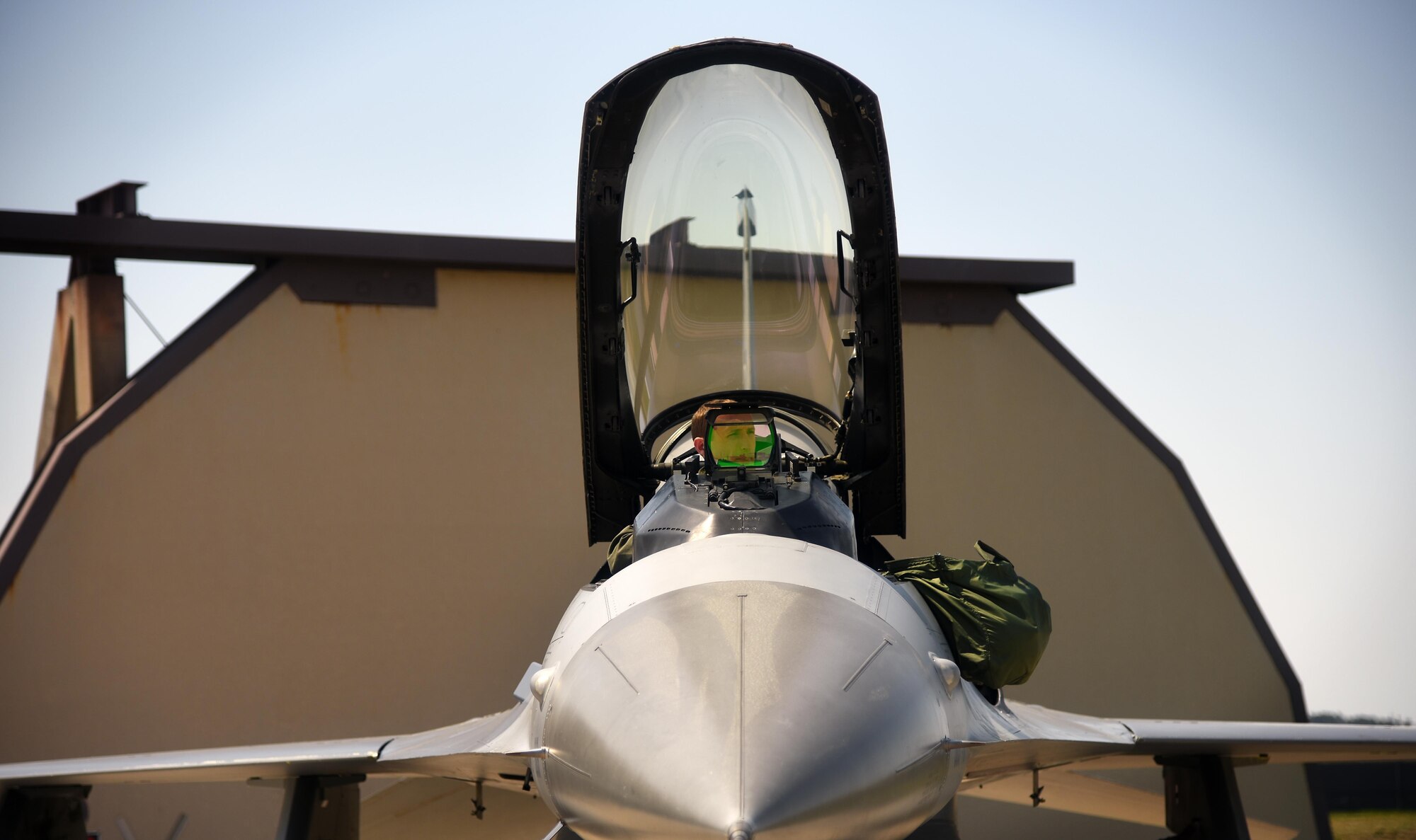 U.S. Air Force 1st Lt. Glenn Miltenberg, 35th Fighter Squadron pilot, buckles himself into the cockpit of an F-16 Fighting Falcon during Exercise MAX THUNDER 17 at Kunsan Air Base, Republic of Korea, April 27, 2017. This large-scale employment exercise increases the U.S. and ROK’s ability to work together shoulder-to-shoulder and ultimately enhances the U.S. and ROK capability to maintain peace in the region. (U.S. Air Force photo by Tech. Sgt. Jeff Andrejcik/Released)