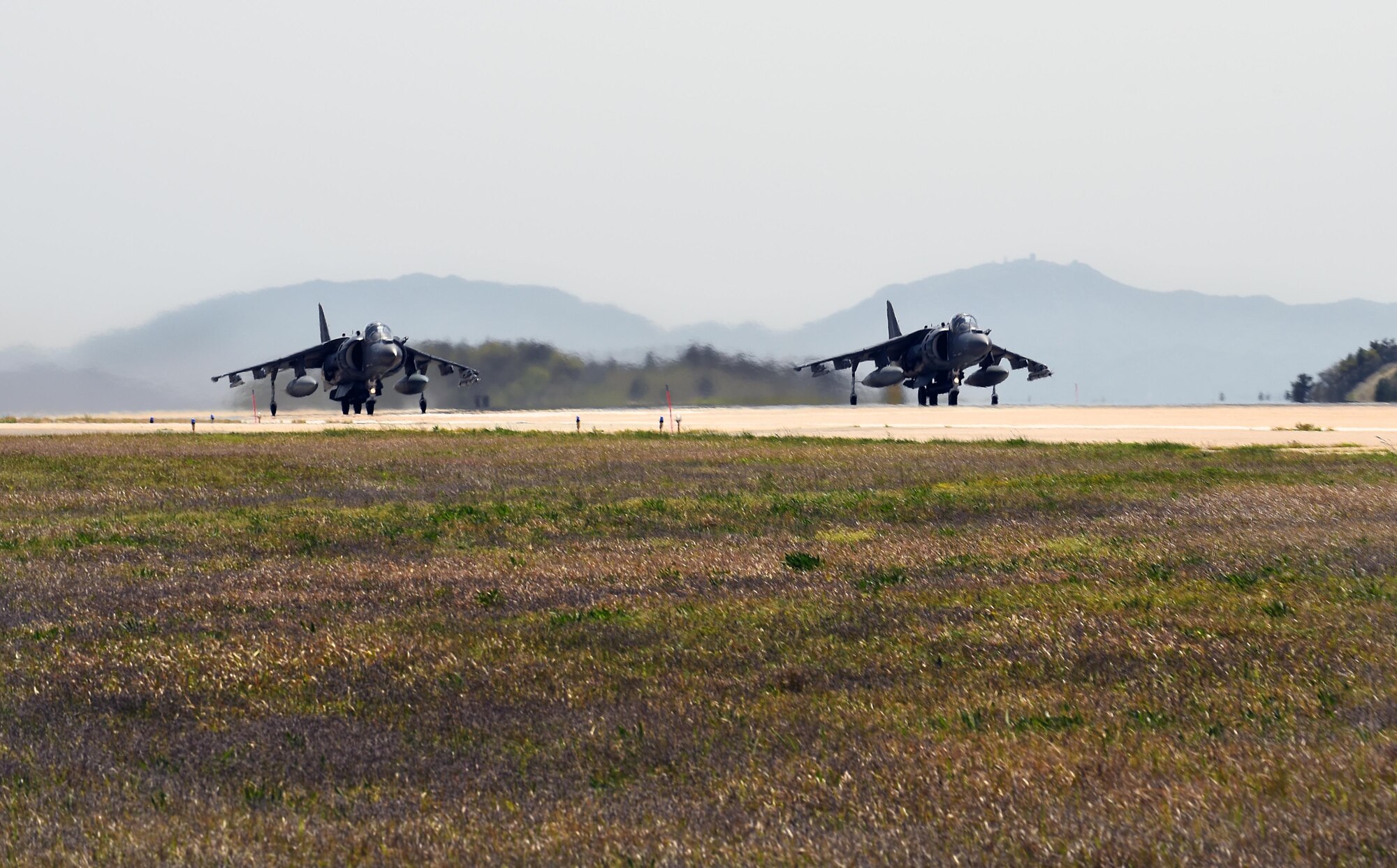 U.S. Marine Corp AV-8B Harriers with Marine Attack Squadron (VMA) 311 prepare for takeoff during Exercise MAX THUNDER 17 at Kunsan Air Base, Republic of Korea, April 27, 2017. In Max Thunder, U.S. and ROK air forces consistently train together to be ready around-the-clock to defend the Republic of Korea. The interoperability and trust developed between the allies in training is critical to ensure we are prepared for any challenge. (U.S. Air Force photo by Tech. Sgt. Jeff Andrejcik/Released)