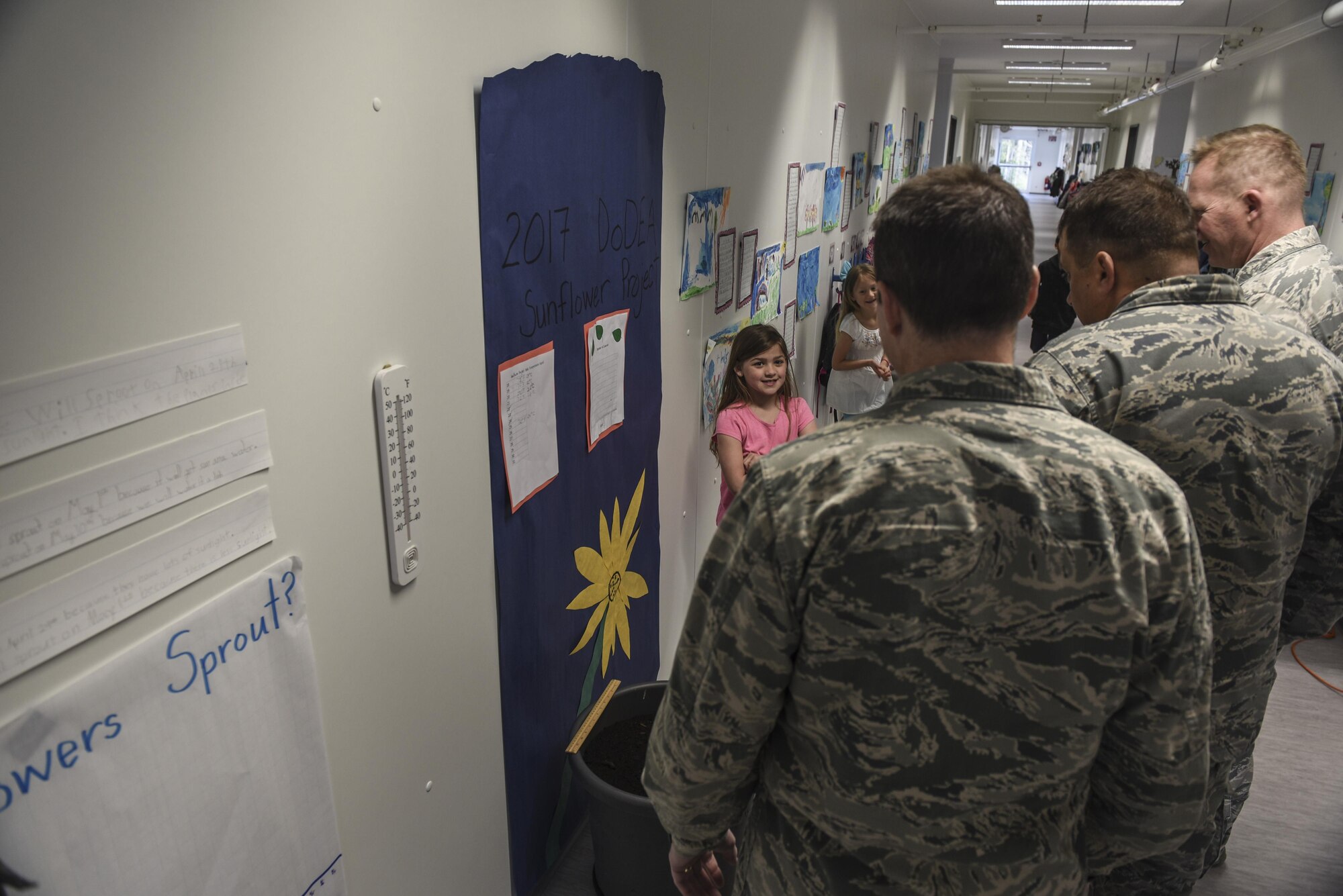 Spangdahlem Elementary School students give the 52nd Fighter Wing leadership team, a tour of the new modular building at Spangdahlem Air Base, Germany, April 26, 2017. The elementary school expansion project was made possible by collaborative efforts from the DOD Education Activity, Elementary School leadership, 52nd Civil Engineer Squadron engineers and a Germany contracting agency. (U.S. Air Force photo by Senior Airman Dawn M. Weber)