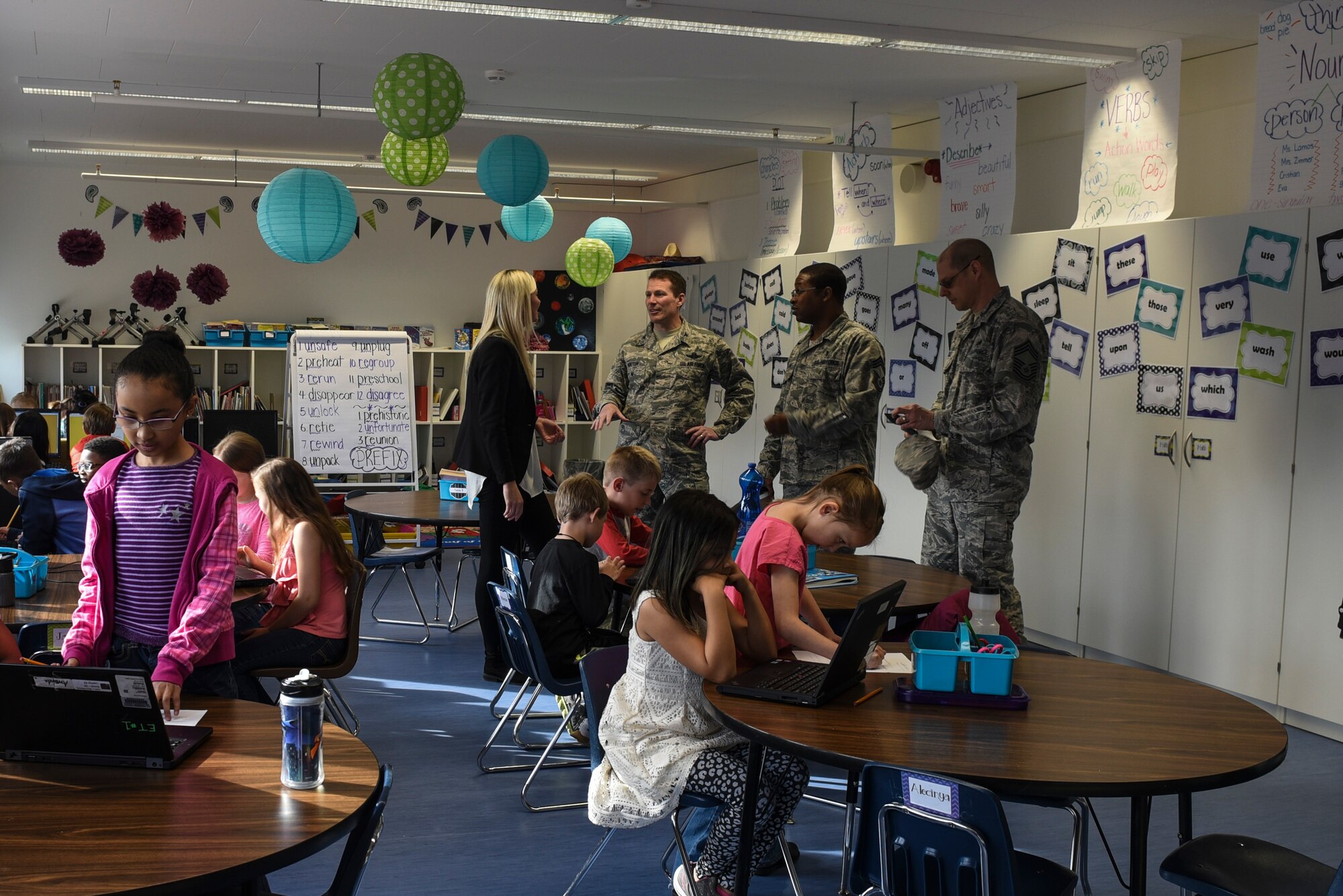 Col. Steven Horton, 52nd Fighter Wing vice commander and other members of wing leadership speak with a Spangdahlem Elementary School teacher in a new modular classroom at Spangdahlem Air Base, Germany, April 26, 2017. The modular unit now allows for all elementary school students to be educated on Spangdahlem AB. Previously, elementary age students were split between here and Bitburg AB. (U.S. Air Force photo by Senior Airman Dawn M. Weber)