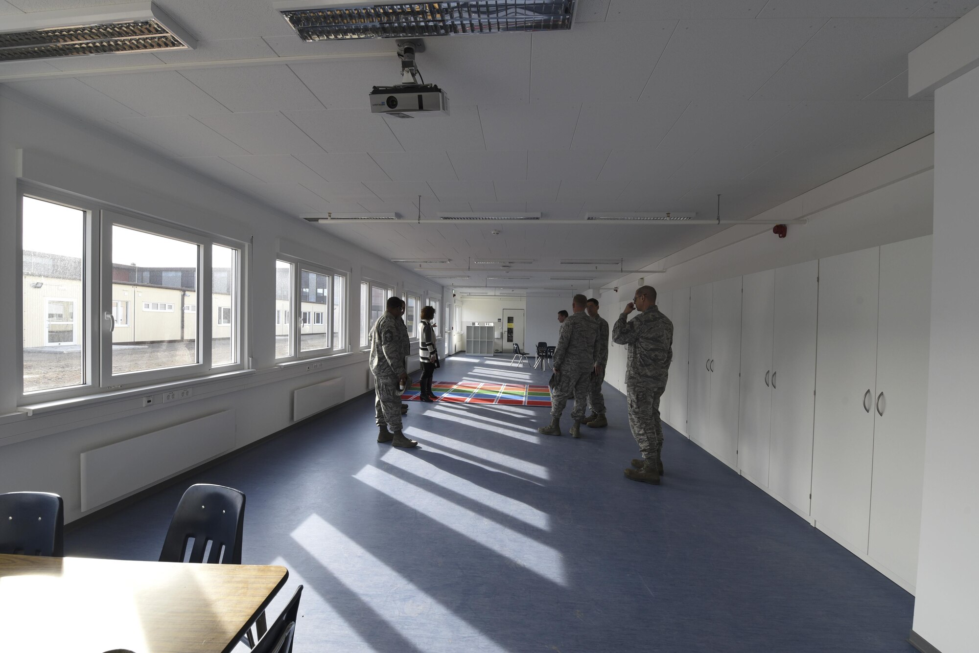 52nd Fighter Wing leadership receive a tour of the new modular classrooms from Angelique Lamonski, Principal of Spangdahlem Elementary School at Spangdahlem Air Base, Germany, April 26, 2017. The modular unit now allows all elementary school students to be educated on Spangdahlem AB. Previously, elementary age students were split between here and Bitburg AB. (U.S. Air Force photo by Senior Airman Dawn M. Weber)