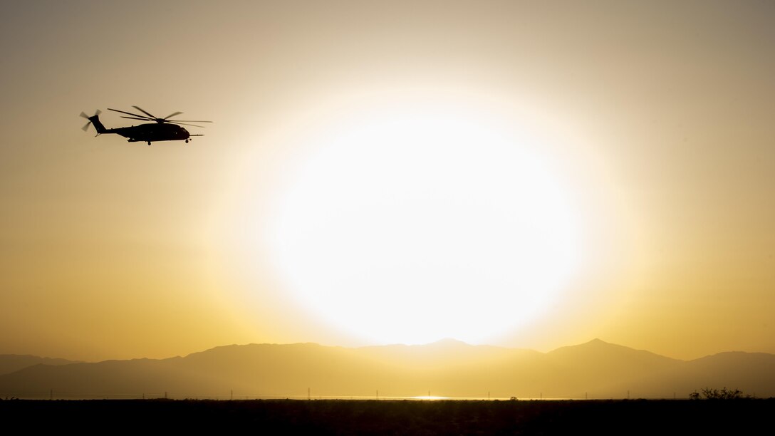A U.S. Marine Corps CH-53E Super Stallion assigned to Marine Aviation Weapons and Tactics Squadron One ascends during assault support tactics 2 as part of Weapons and Tactics Instructor course 2-17 at Artillery Fire Area 1, Slab City, Calif., April 19, 2017. AST-2 is an exercise focused on executing a dual-site, simultaneous night raid with a company sized element that integrates combined arms using the six functions of WTI is a seven-week training event hosted by MAWTS-1 cadre, which emphasizes operational integration of the six functions of Marine Corps aviation in support of a Marine Air Ground Task Force and provides standardized advanced tactical training and certification of unit instructor qualifications to support Marine Aviation Training and Readiness and assists in developing and employing aviation weapons and tactics. 