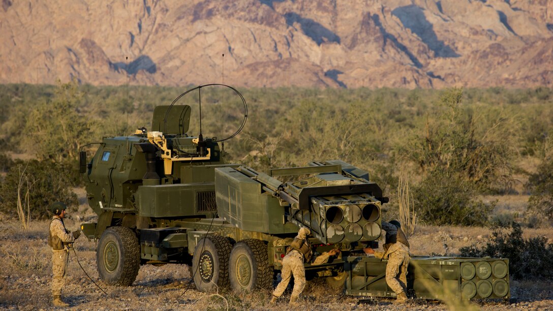 U.S. Marines with 2nd battalion, 14th Marine regiment, 4th Marine division load rockets into a high mobility artillery rockets M142 System during assault support tactics 2, as part of Weapons and Tactics Instructor course 2-17 at Artillery Fire Area 1, Slab City, Calif., April 19, 2017. AST-2 is an exercise focused on executing a dual-site, simultaneous night raid with a company sized element that integrates combined arms using the six functions of WTI is a seven-week training event hosted by Marine Aviation Weapons and Tactics Squadron One cadre, which emphasizes operational integration of the six functions of Marine Corps aviation in support of a Marine Air Ground Task Force and provides standardized advanced tactical training and certification of unit instructor qualifications to support Marine Aviation Training and Readiness and assists in developing and employing aviation weapons and tactics.