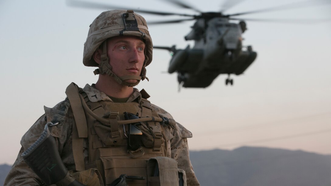 Pfc. Benjamin Kelly, machinegunner, 2nd Battalion, 6th Marine Regiment, provides security as a CH-53 ‘Super Stallion’ helicopter lands at Del Valle Field during a non-combatant Evacuation Operation exercise as part of Weapons and Tactics Instructor Course 2-17 at Marine Corps Air Ground Combat Center Twentynine Palms, Calif., April 21, 2017. NEO exercises simulate real-life scenarios where non-combatants are evacuated from a potentially hostile area.