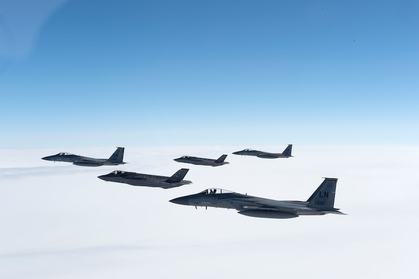 Two Air Force F-35A Lightning IIs from the 388th Fighter Squadron and three F-15C Eagles from the 493rd Fighter Squadron fly in formation during a training sortie over the United Kingdom, April 27, 2017. The F-35As first arrived at Royal Air Force Lakenheath, England, April 15, from Hill Air Force Base, Utah, marking the aircraft’s first flying training deployment to Europe. Air Force photo by Tech. Sgt. Roidan Carlson
