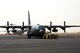 A C-130H Hercules is towed on the flightline at an undisclosed location in Southwest Asia April 24, 2017. The Aircraft, which is assigned to the 103rd Airlift Wing, delivers cargo and personnel downrange in support of Operation Inherent Resolve. (U.S. Air Force photo/Tech. Sgt. Kenneth McCann)