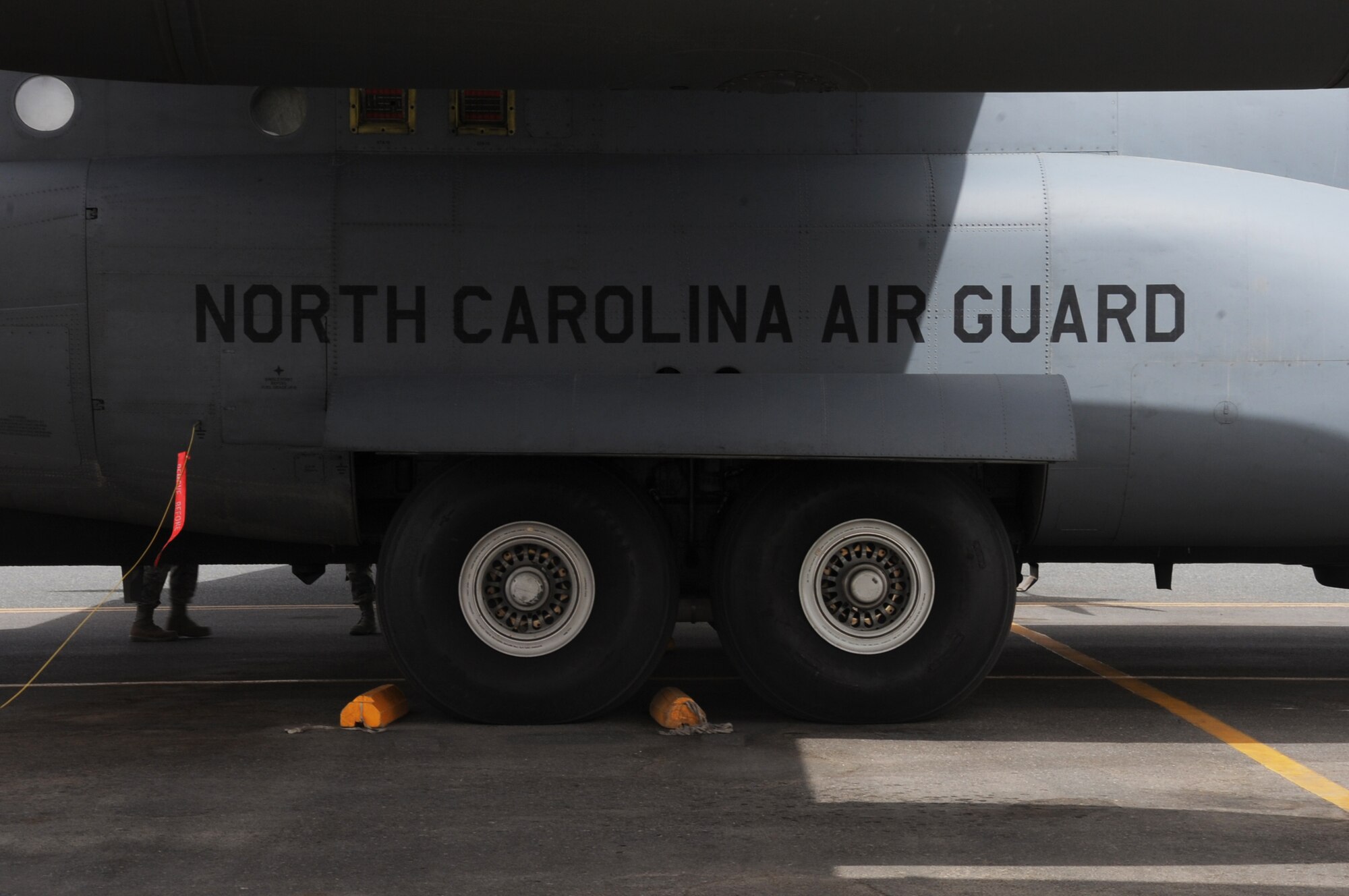 A C-130H Hercules from the 143rd Airlift Wing sits on the flight April 24, 2017, at an undisclosed location in Southwest Asia. The aircraft is capable of delivering personnel and cargo downrange in the support of the fight against ISIS.  (U.S. Air Force photo/Tech. Sgt. Kenneth McCann)