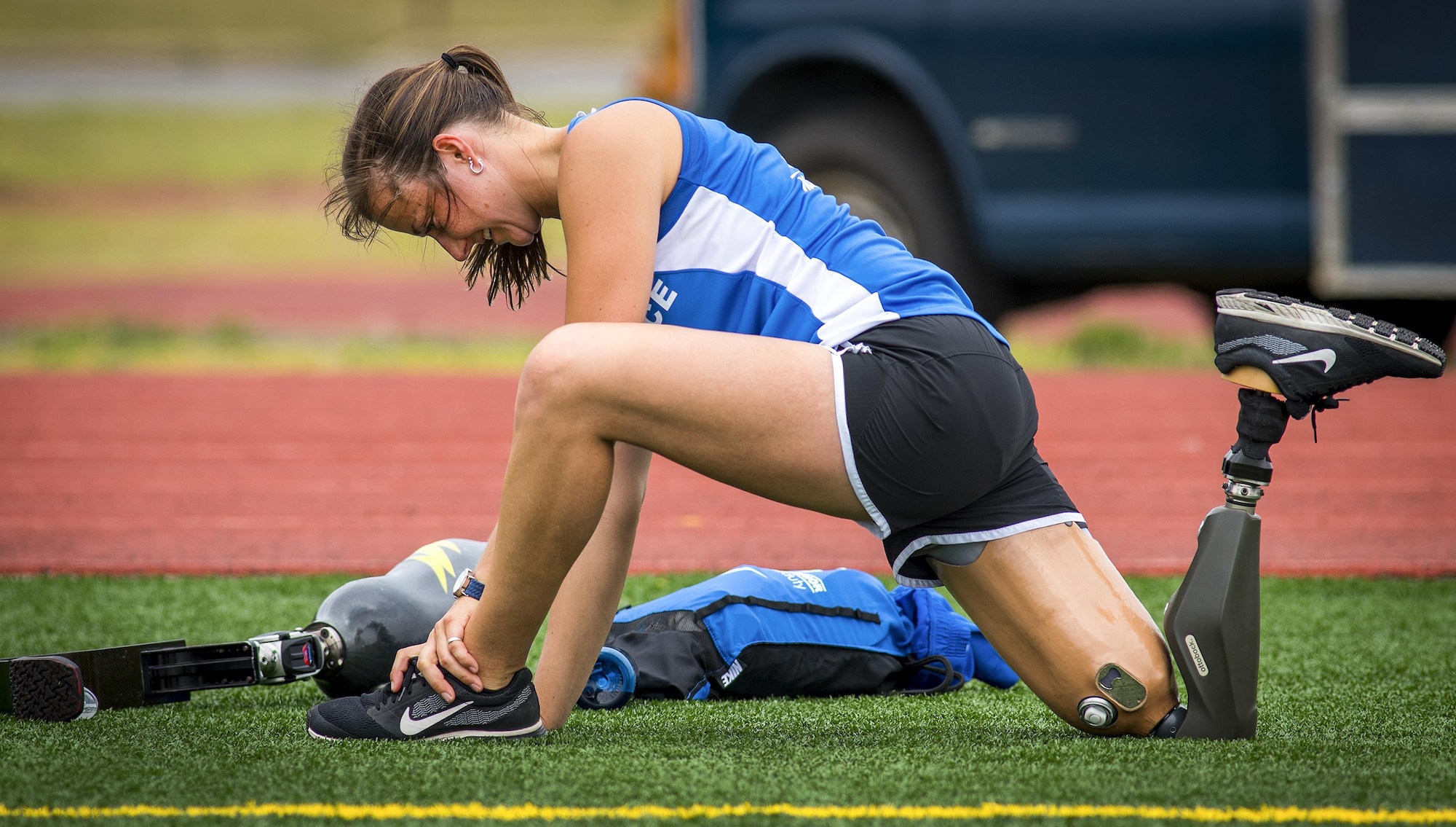 Christy Wise, a Warrior Games athlete, stretches after a run during a track and field session at the Air Force team’s training camp at Eglin Air Force Base, Fla., April 27. The base-hosted, week-long Warrior Games training camp is the last team practice session before the yearly competition in June. (U.S. Air Force photo/Samuel King Jr.)